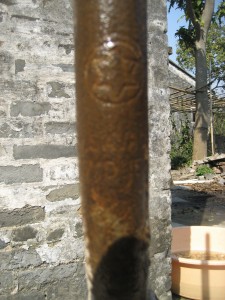 Detailed close-up of a rusty shovel handle